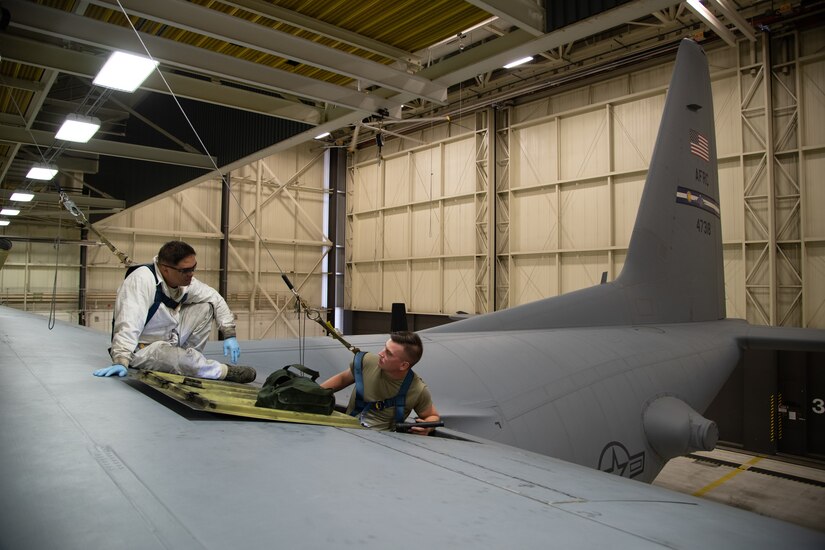 FAA-certified technician performing an inspection