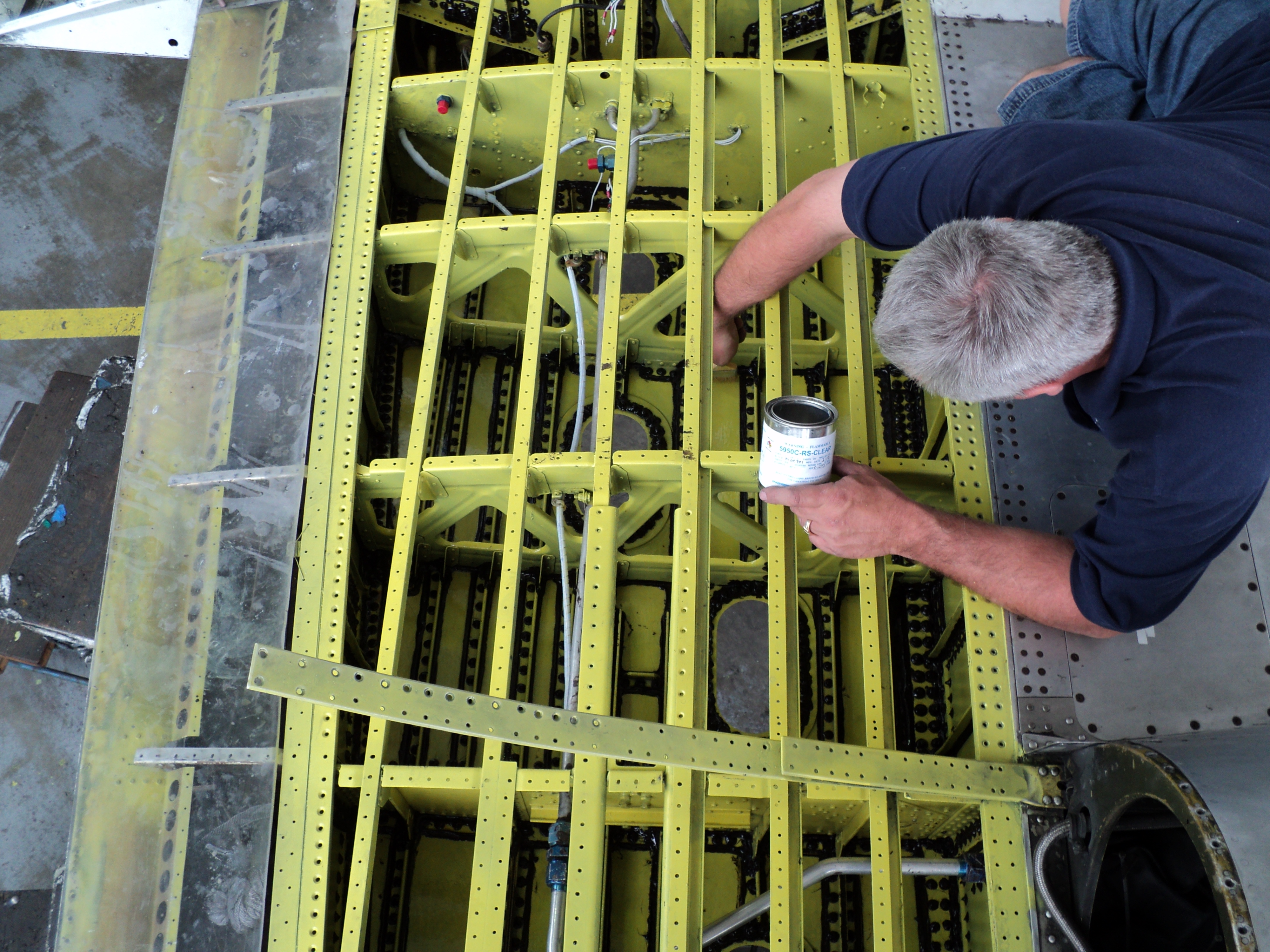NAAS & Accessories technician performing inspection and repair.