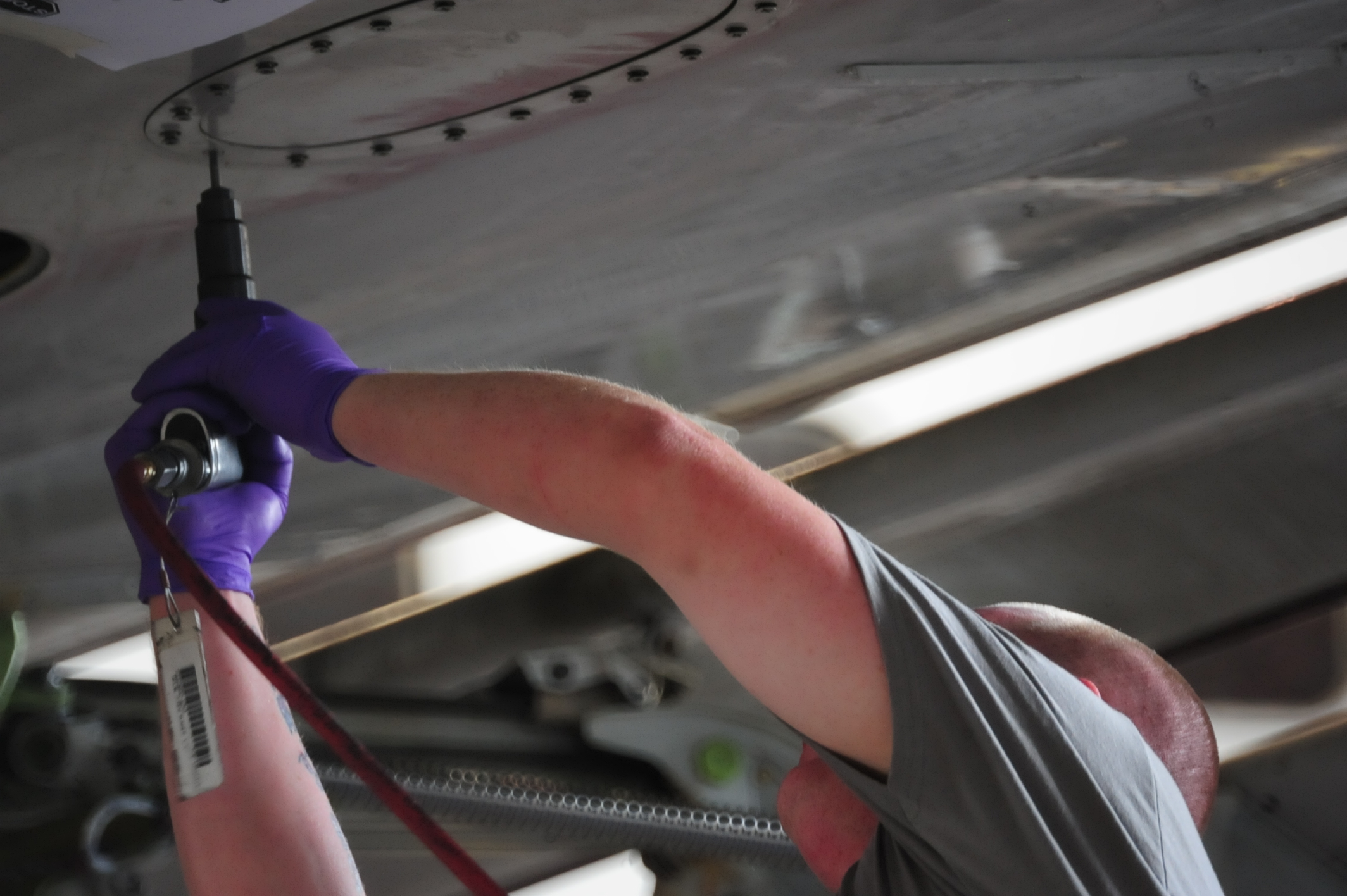 NAAS & Accessories technician performing an emergency fuel tank inspection